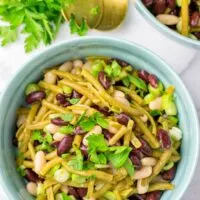 Fresh parsley is used to decorate this easy bean salad.