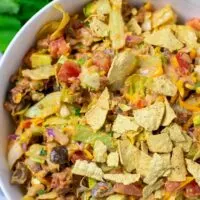 Top view on a large serving bowl with the Taco Salad.