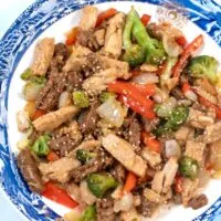 Closeup view of Chicken and Steak Stir Fry.