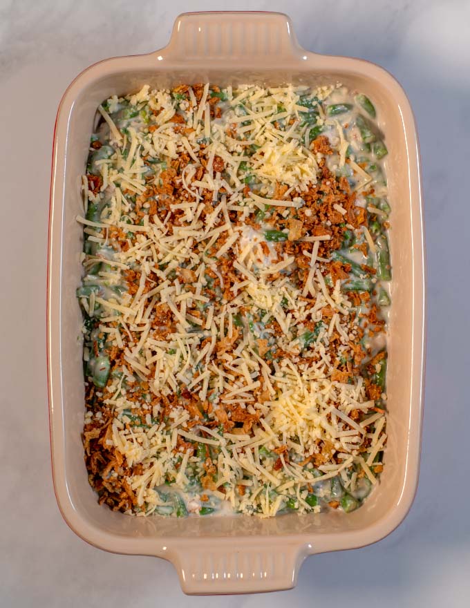 A top view of a baking dish with Green Bean Casserole with Cream Cheese before baking.