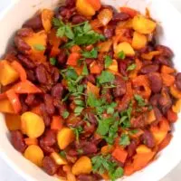 Puerto Rican Beans in a white serving bowl.