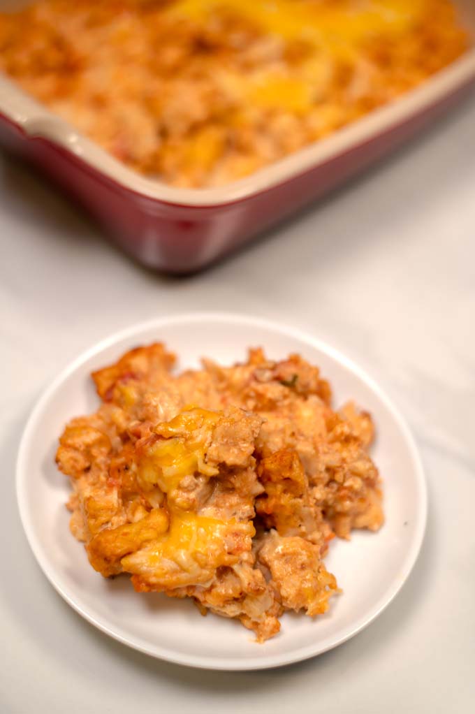 A small serving of Keto Mexican Chicken Casserole on a white plate.