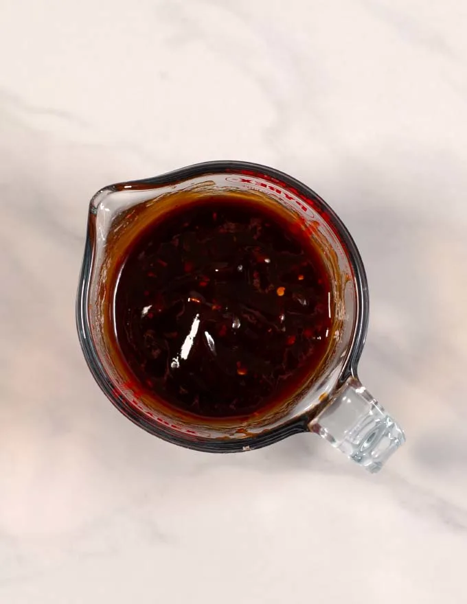 Ready mixed Pad Thai Sauce with Ketchup in a mixing bowl.