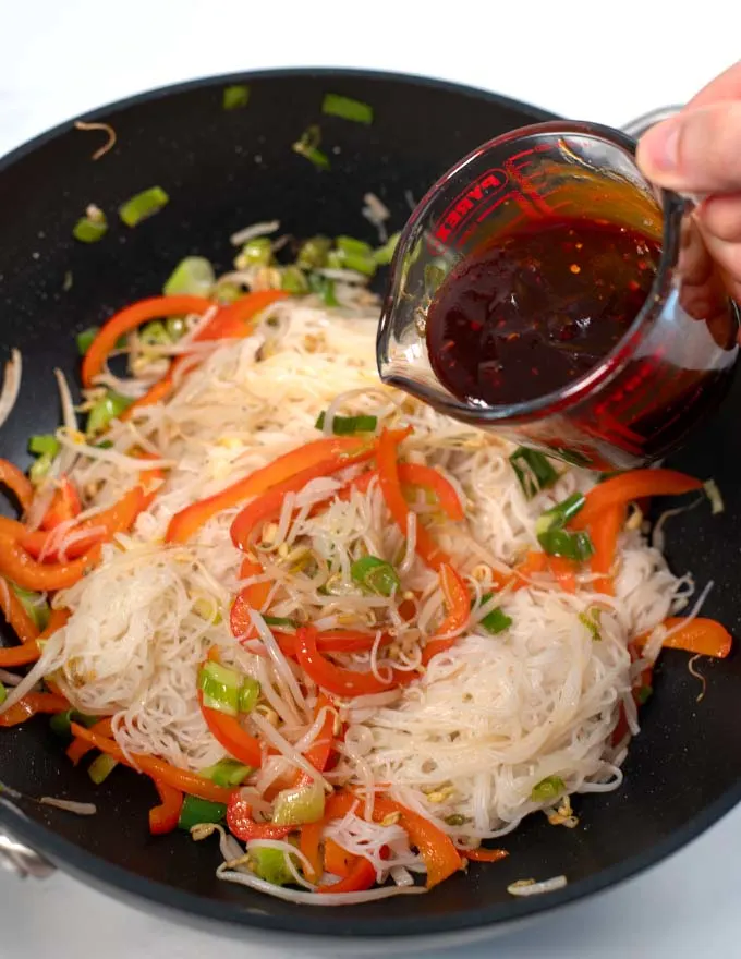 Pad Thai Sauce with Ketchup is ready to be given over stir fry in a wok.