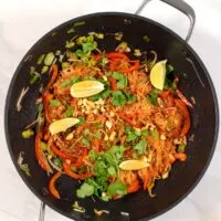 Top view of a wok with Pad Thai.