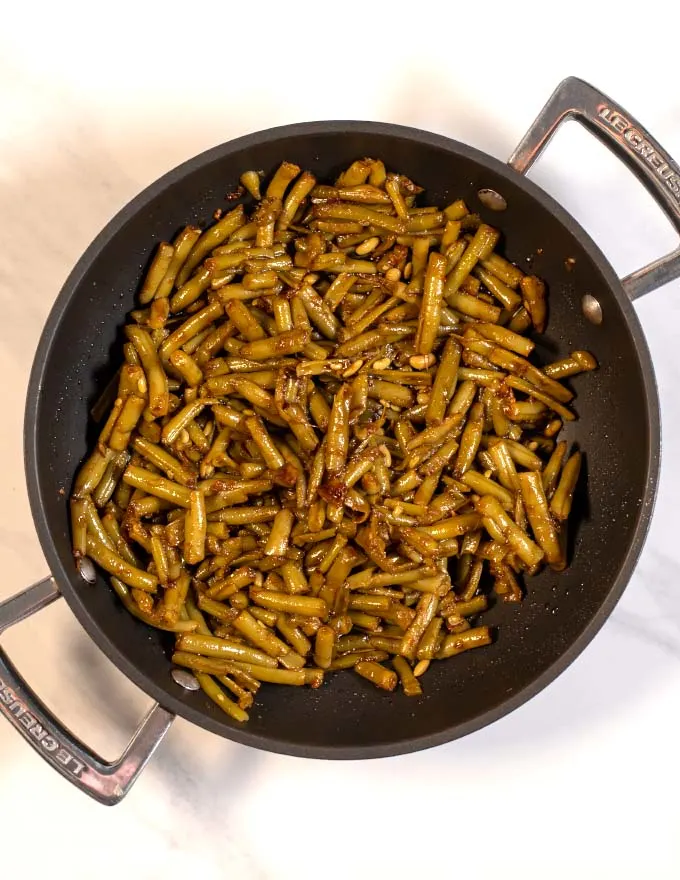 Canned Green Beans are sautéed in soy sauce.