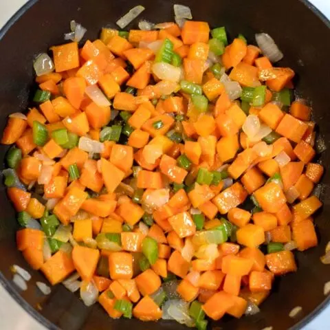 Closeup on the mix of carrots, celery and onions.