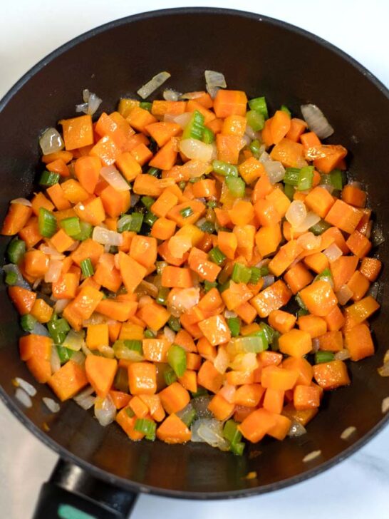 Closeup on the mix of carrots, celery and onions.