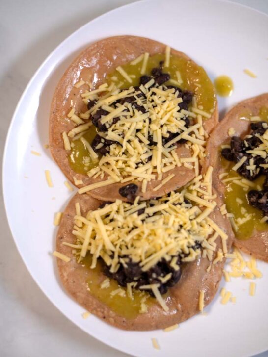 Closeup of a serving of three Mexican Chalupas.