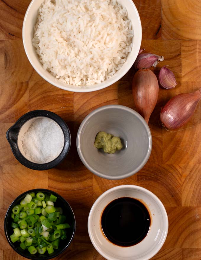 Ingredients needed to make Wasabi Fried Rice on a wooden board.