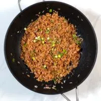 Fresh scallions are used to garnish Wasabi Fried Rice.