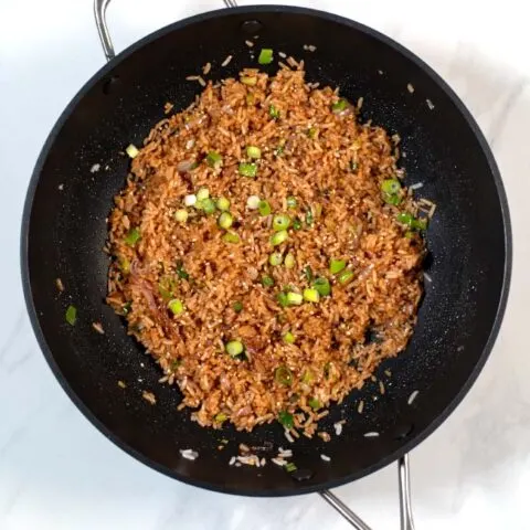 Fresh scallions are used to garnish Wasabi Fried Rice.