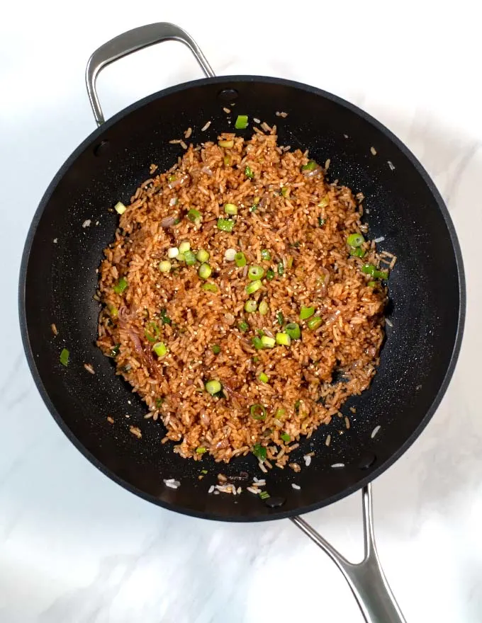 Fresh scallions are used to garnish Wasabi Fried Rice.