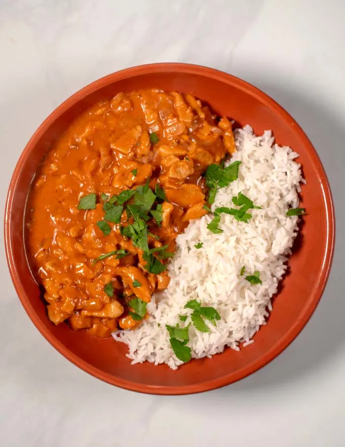 A serving of Chicken Masala with rice.