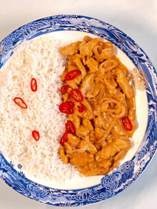 A serving of Thai Red Curry with white rice.