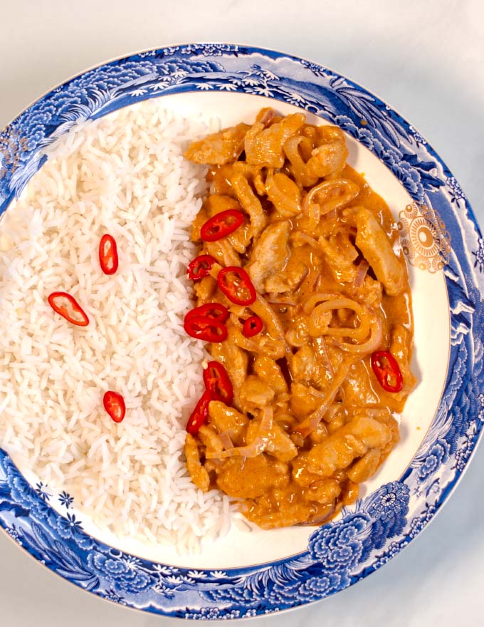 A serving of Thai Red Curry with white rice.