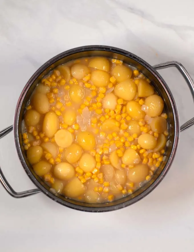 View of Corn chowder in a large pot.