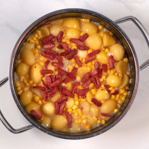 Vegan bacon is added to the Corn Chowder.