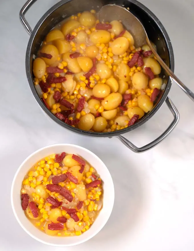 Corn Chowder is served in a bowl.