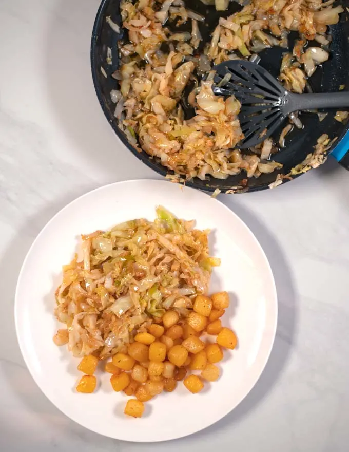 Serving of Cabbage and Onion with potatoes.