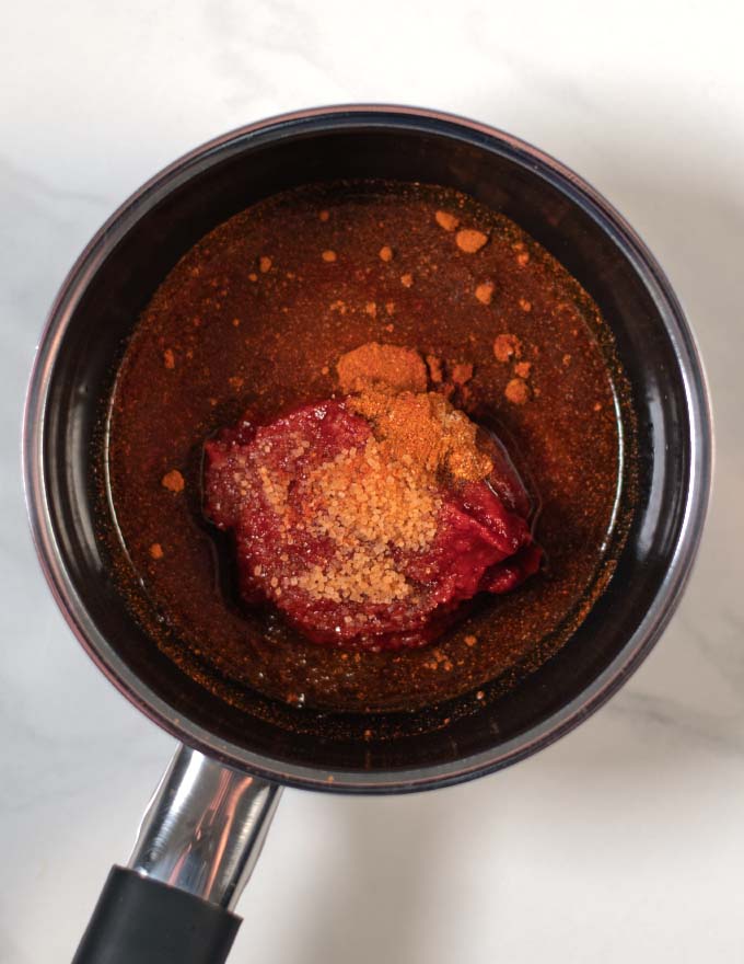 Top view of a saucepan with the ingredients for Chili Sauce.