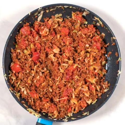 Top view of a pan with Hamburger and Cabbage