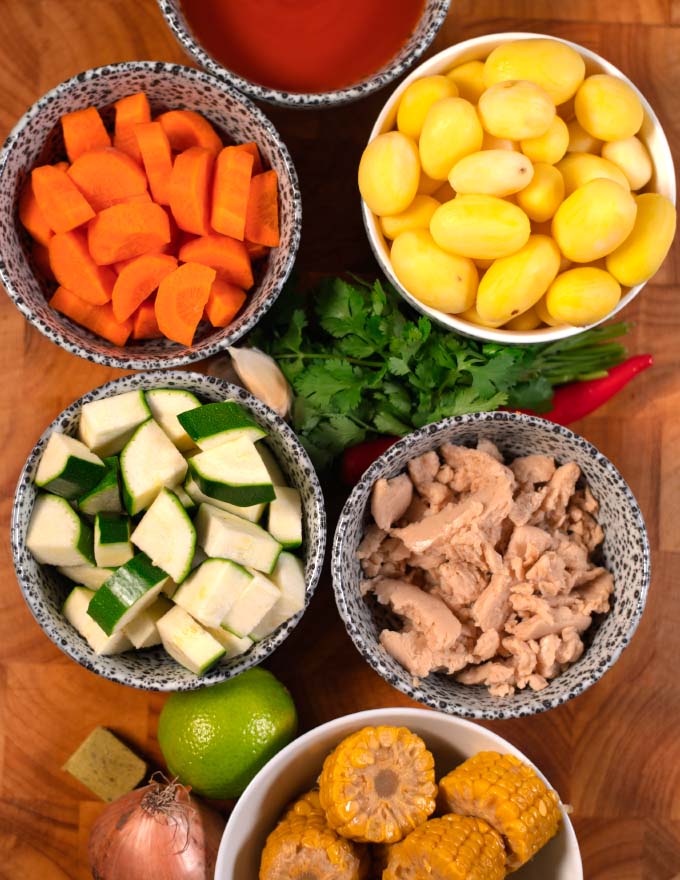 Ingredients needed for making Caldo de Pollo are collected before cooking.