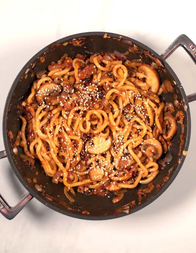 Top view of Simple Udon Noodles garnished with sesame seeds.