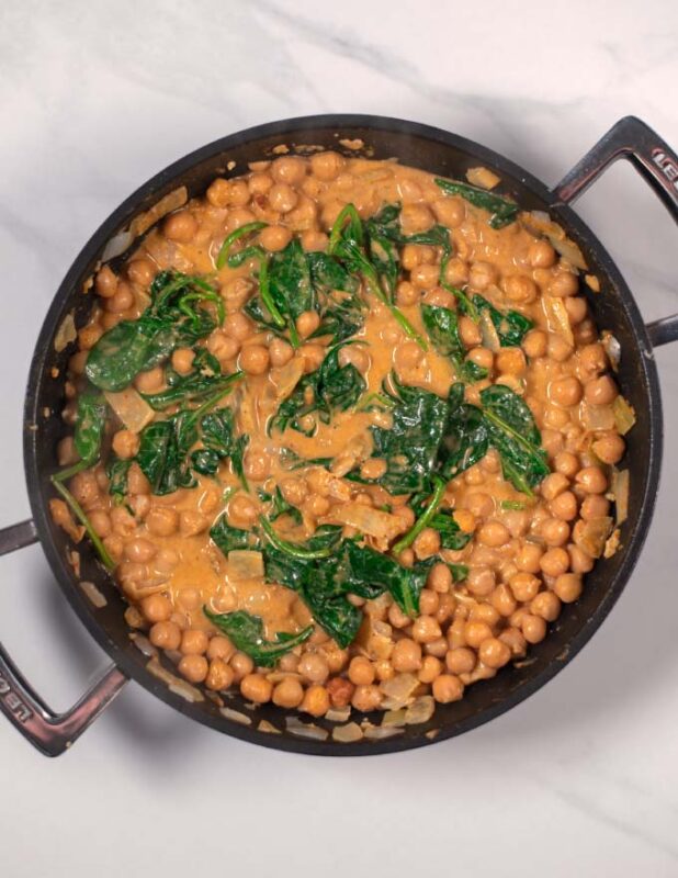 top view of Vegetarian Yellow Thai Curry in a pan.